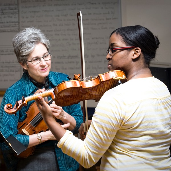 Student playing violin